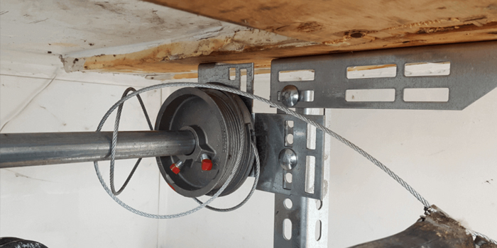 Durand fix garage door cable